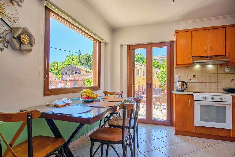 Cozy dining nook with garden views, perfect for enjoying home-cooked meals