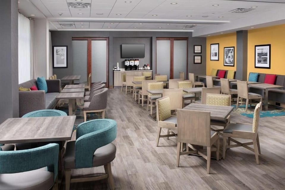 Gather for breakfast in the airy seating area, bright and comfortable.