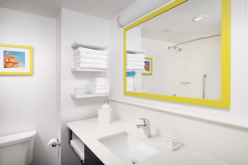 Start your day in a spotless bath with fresh towels.