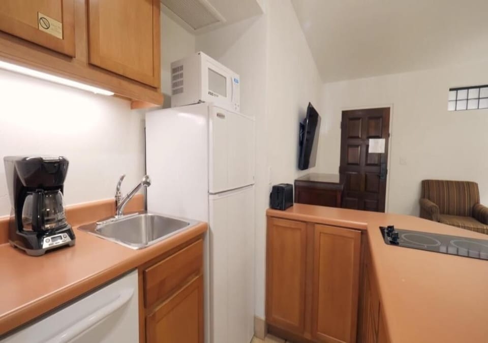 Kitchen. Exact unit will be assigned upon arrival. Views, colors, and decor may vary.