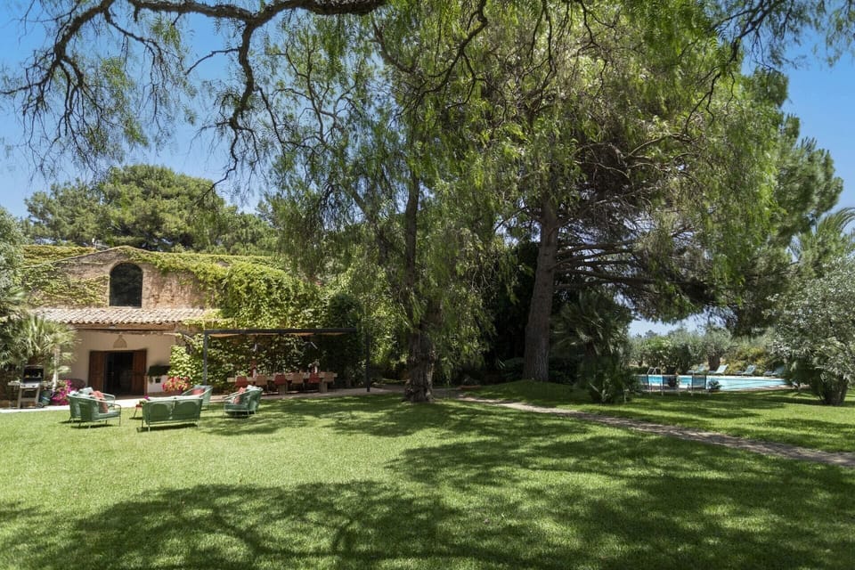 The gorgeous, luxuriant gardens of Balu, with the house to the left and the pool just visible to the right.