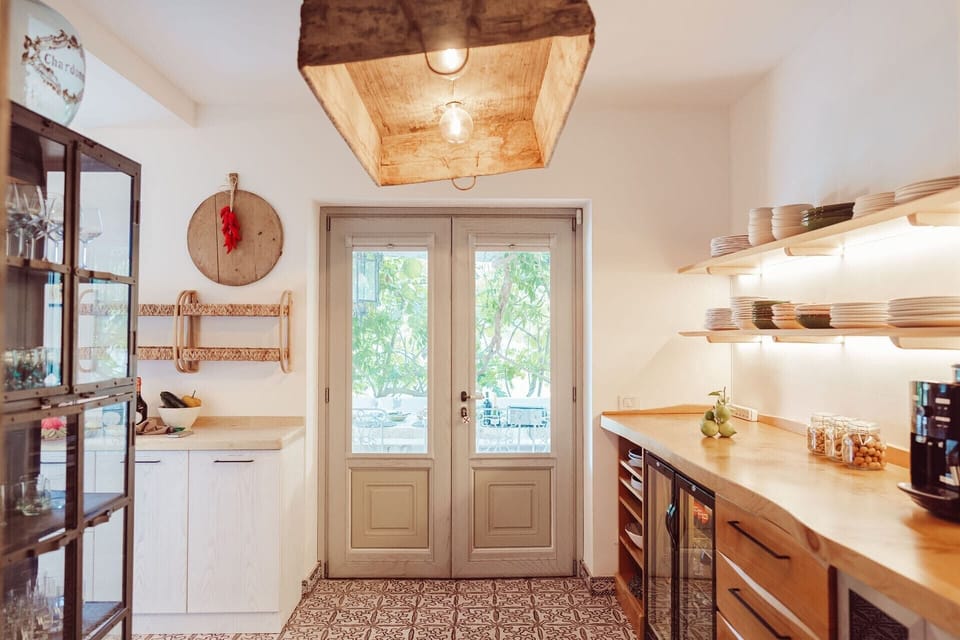 Another shot of the kitchen and its terrace access.