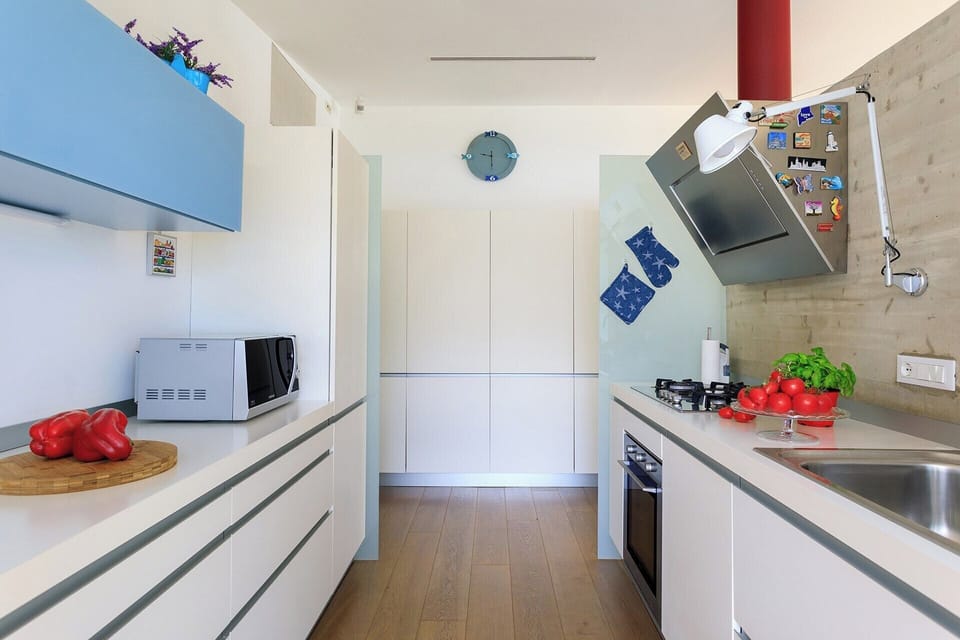 The sleek modern kitchen.