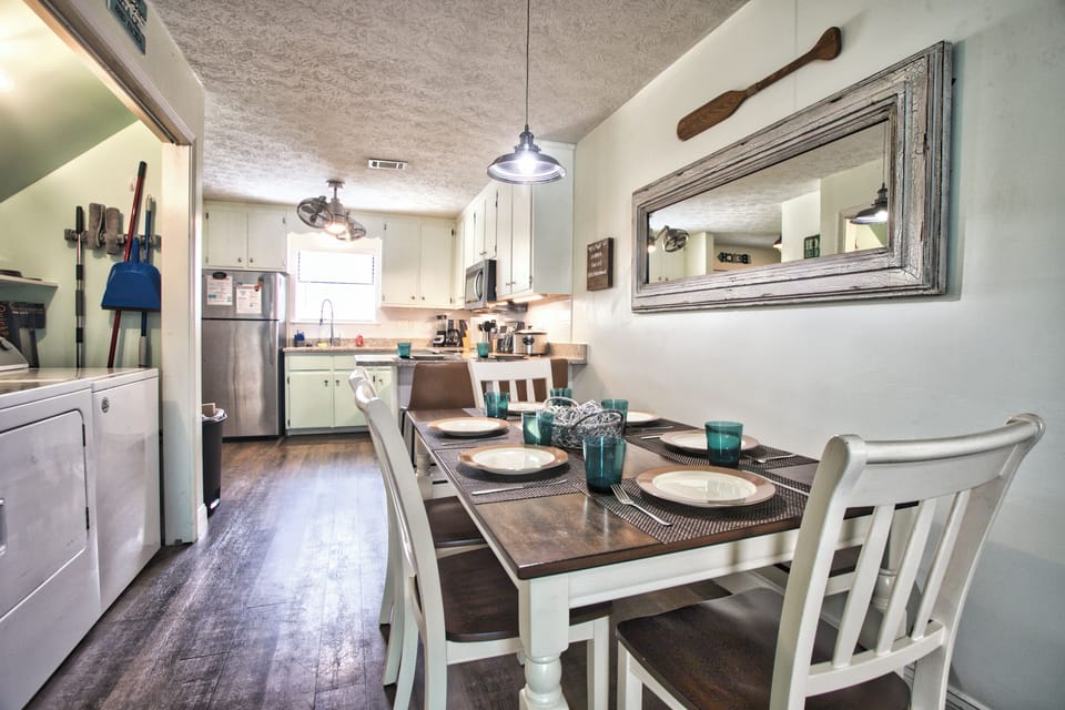 Dining room and laundry. Table seats 6