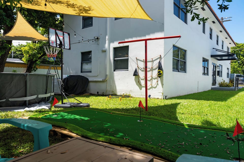 Mini golf and swings under the shade—fun for kids and adults alike.