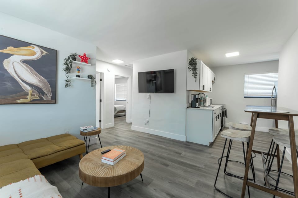 Cozy dining nook with bar seating, perfect for casual meals or morning coffee.