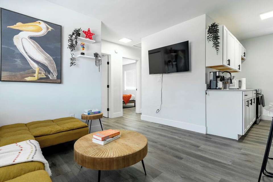 Comfy lounge with Smart TV and bold decor—perfect for relaxing after exploring.