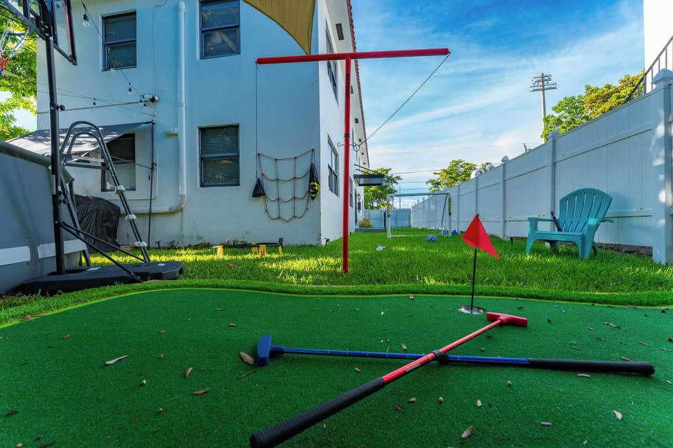 Spacious green area with a kids’ swing and plenty of room to play.