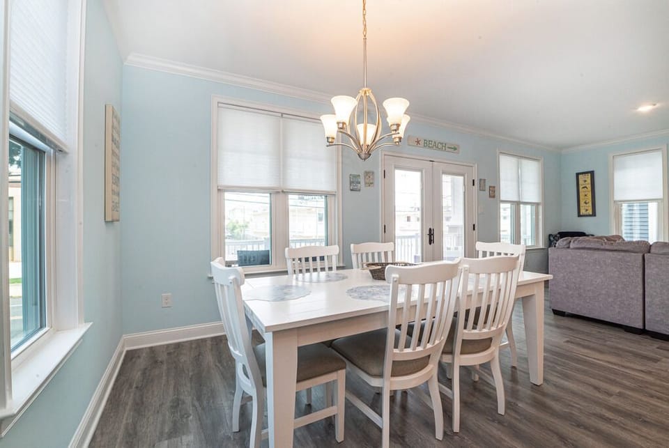 Dining setup with six seats for meals and conversation.
