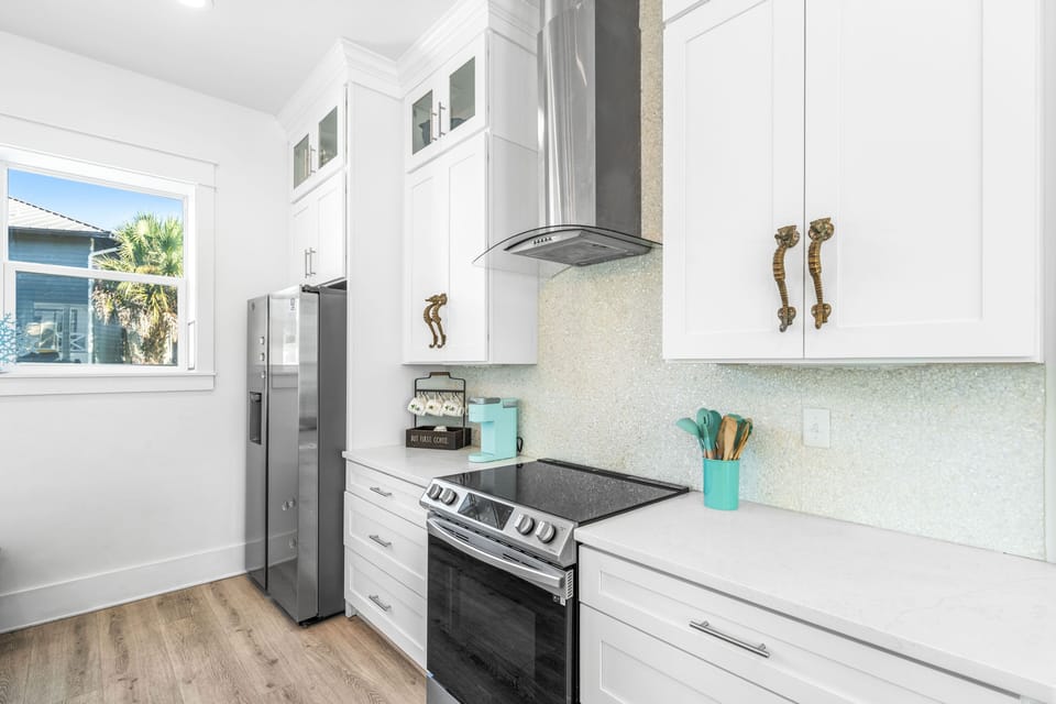 Custom tile backsplash and stainless appliances!