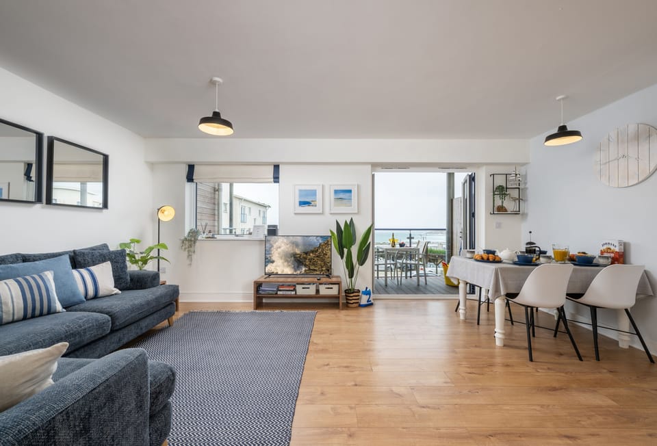 Welcome to 12 Ocean One, a stylish coastal apartment overlooking Fistral Beach in Newquay