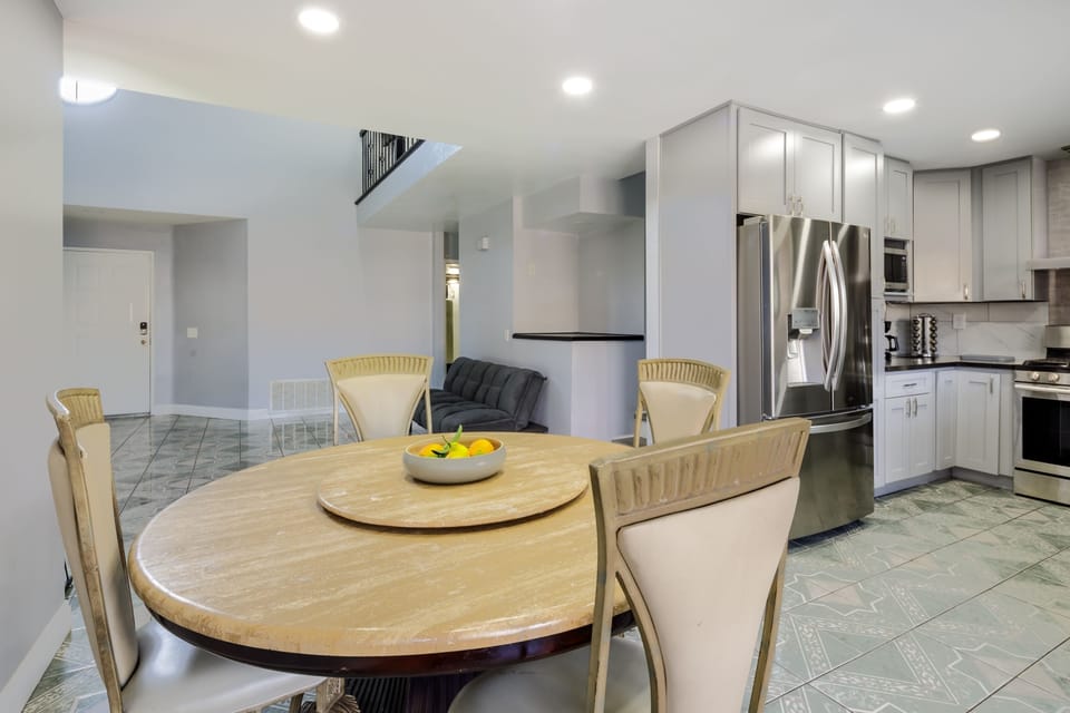Open living-to-dining layout with great natural light and backyard access.