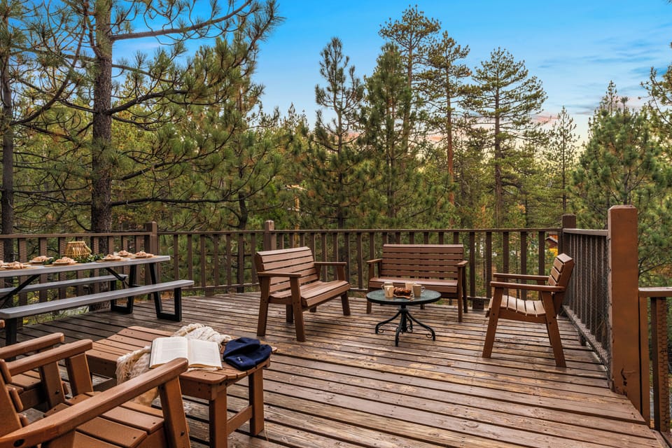 Enjoy your morning coffee or an evening meal on this spacious deck, surrounded by the beauty of the national forest.