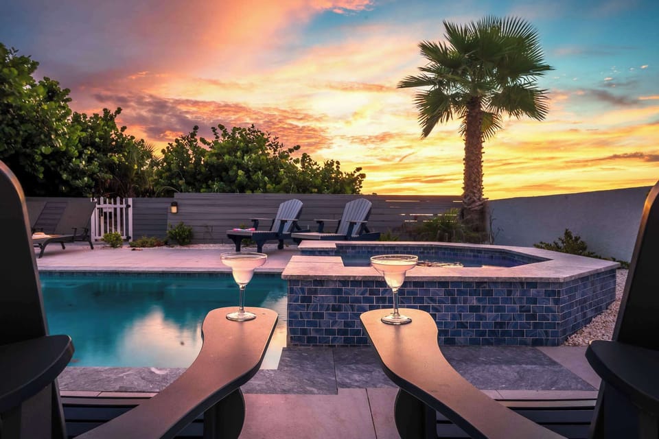 Take a refreshing dip or lounge by the sparkling pool under swaying palms. At sunset, the sky lights up in brilliant colors, creating a magical atmosphere for relaxation.