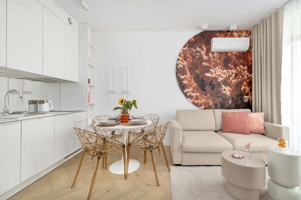 Enjoy your favorite shows on the flat-screen television in the elegant living area.