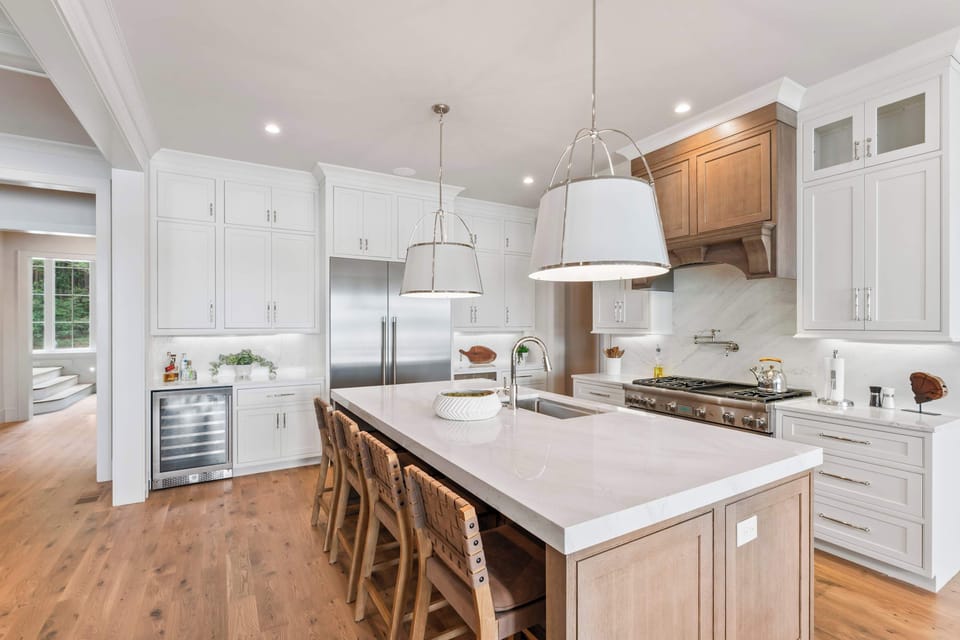 The elegant kitchen offers ample space & all the comforts of home​