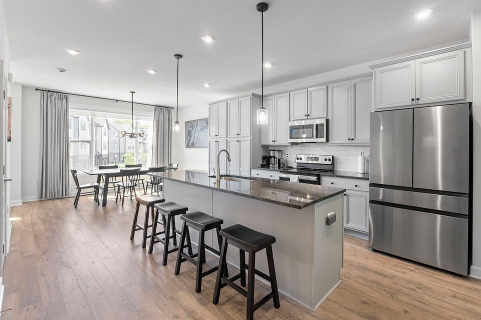 Fully outfitted kitchen for all of your cooking and baking needs. Four stools at the floating island