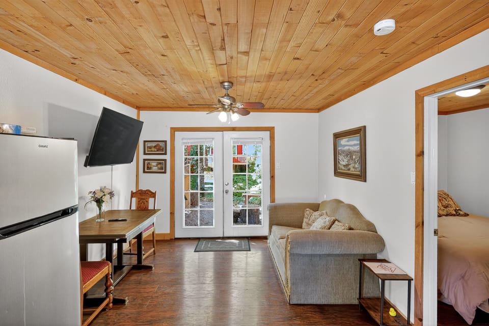 Indoors, Floor, Flooring, Furniture, Living Room