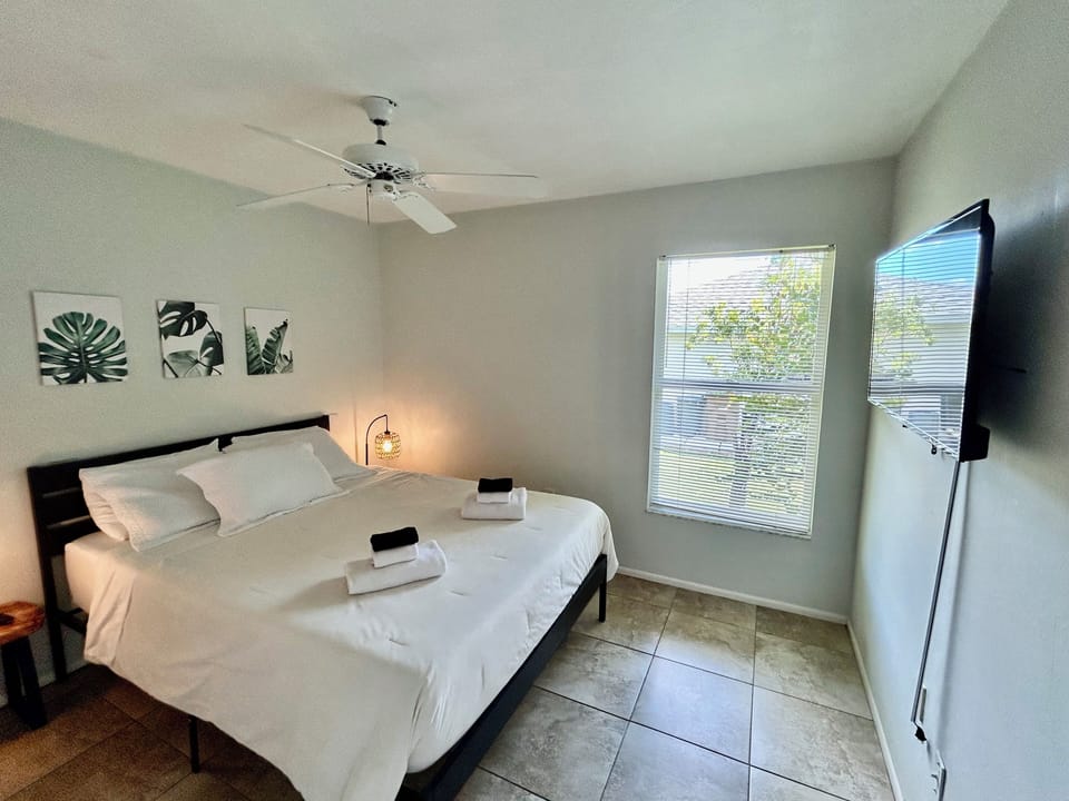 Queen bedroom with tv 