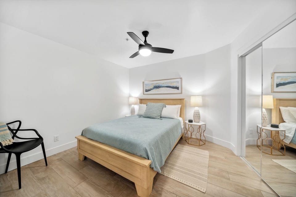 3rd bedroom with queen bed and walk-in closet