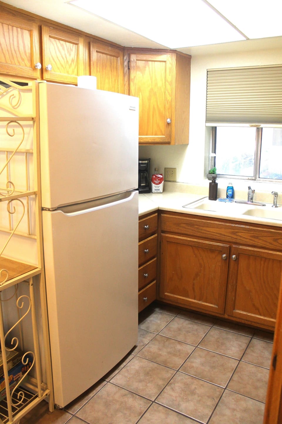 Efficient Kitchen with double sink and ample storage.