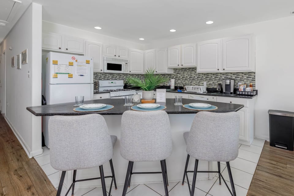 You can find a Keurig coffee maker and a tea kettle in our kitchen. We provide k-cups (both regular coffee and decaf) and assorted tea for you!