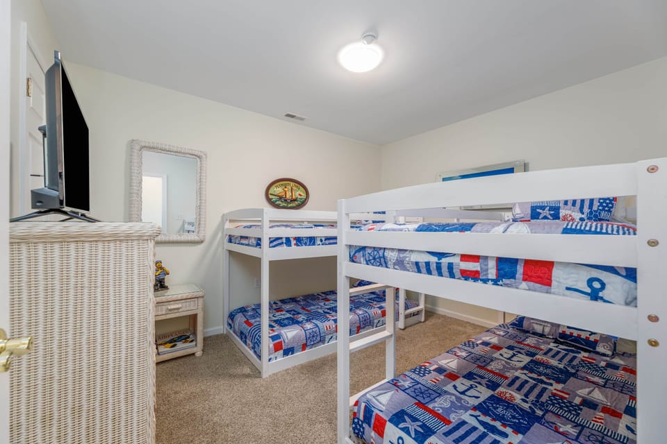 Even adults can sleep comfortably in the twin bed! My husband (5'11", ~210 lbs) sleeps here fine :)