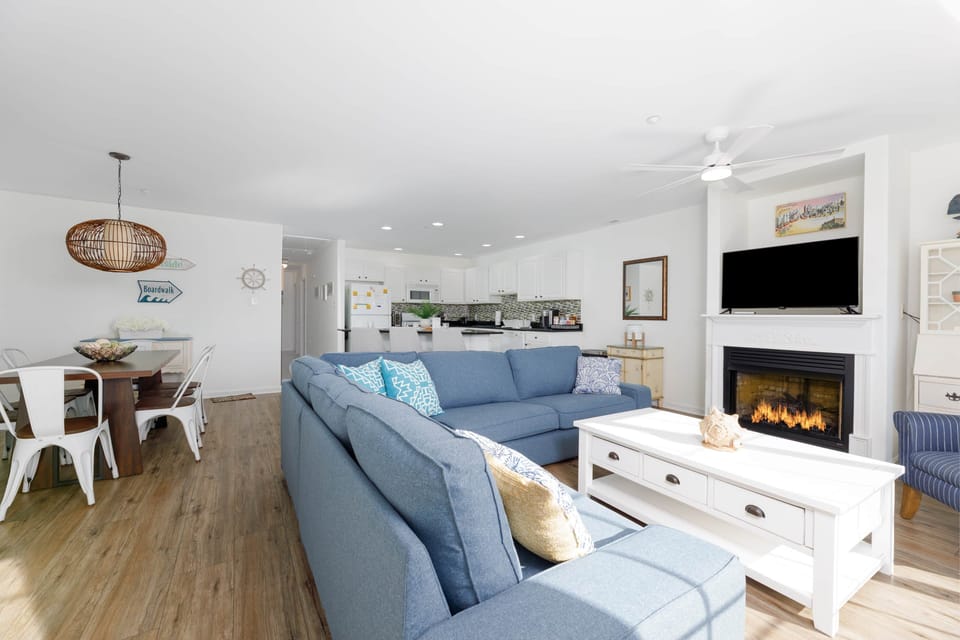 Welcome to your living room, with a fireplace for stay during the colder months!