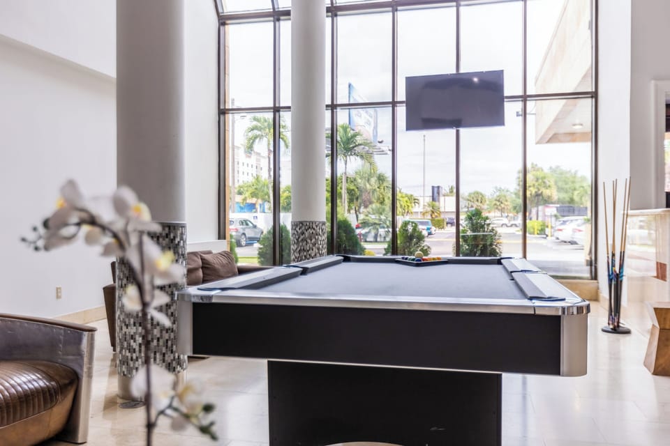 Challenge friends to a casual pool game in style.