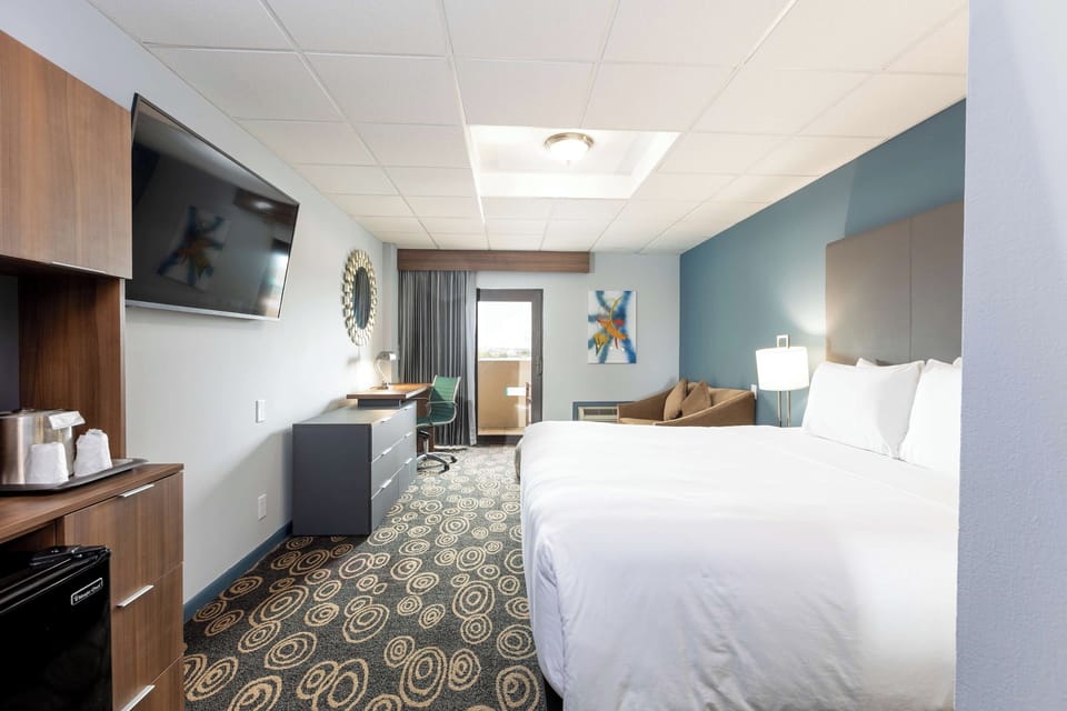 Unwind on crisp linens after a day of exploring.