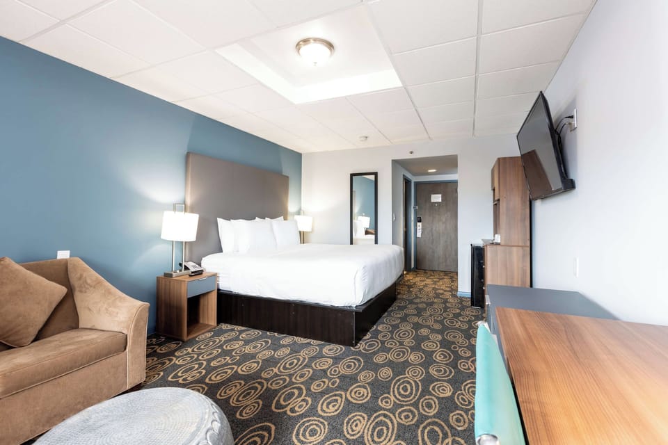 Stretch out in a bright room with cozy seating nearby.