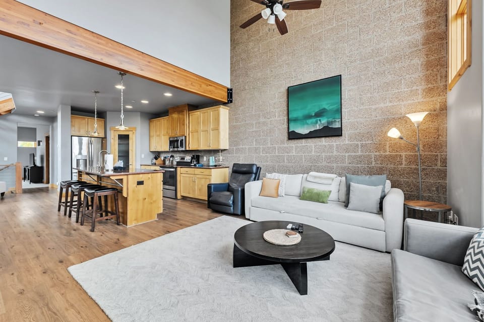 Living room: Decorative fireplace, 65” Smart TV