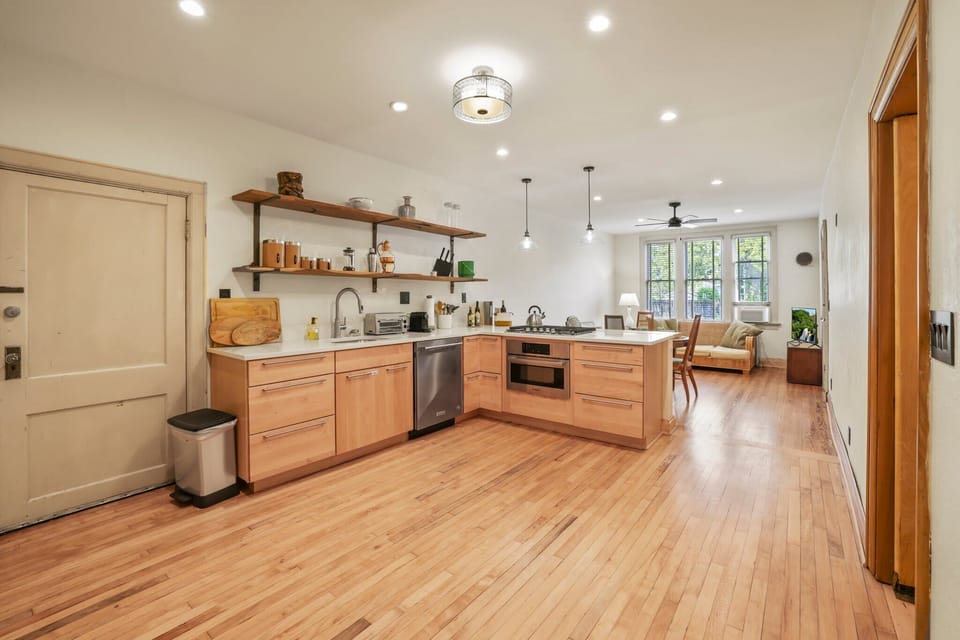 This kitchen has a stove top with NO OVEN, but does have a microwave. 