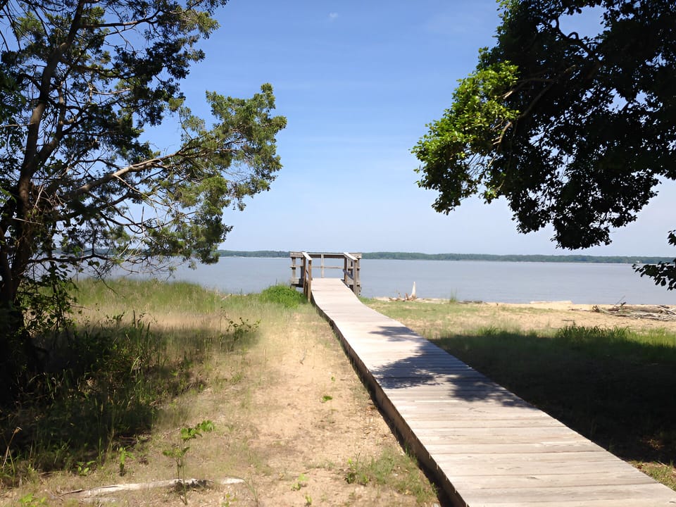 Stroll the boardwalk to calming water views and sandy shores.