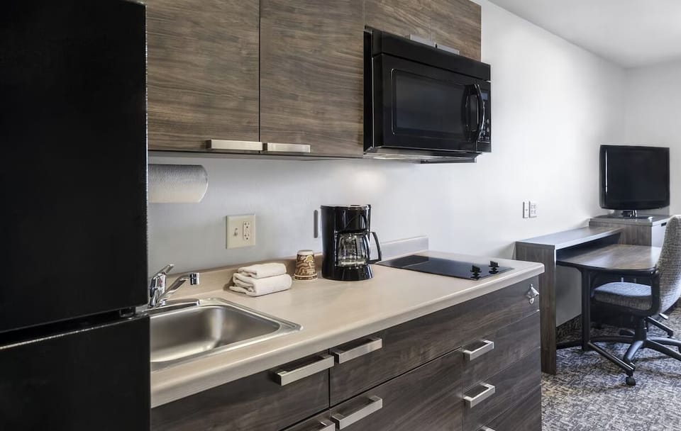 Prep quick bites easily with sink, cooktop, and microwave.