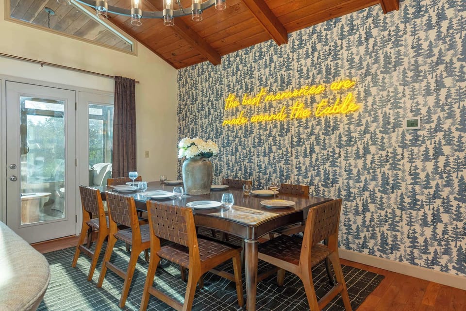 Big table, bigger laughs. Whether it’s family feasts or takeout nights, this dining space was built for togetherness.