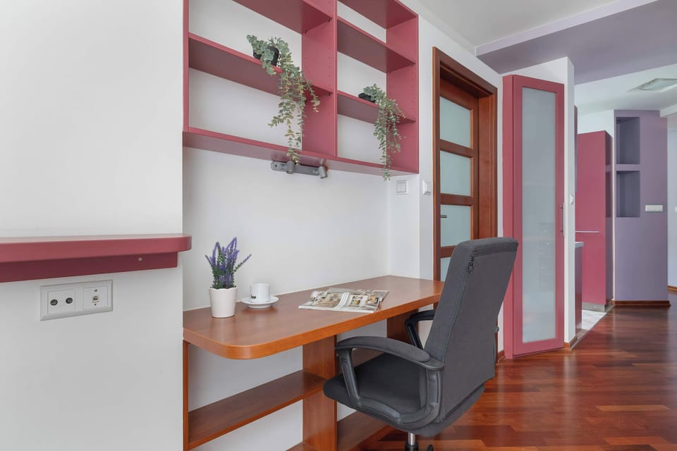 The living room's sleek design is both functional and aesthetically pleasing.