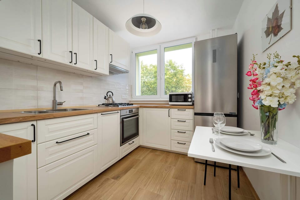 Cook and dine in style with the modern kitchenette and dining area.