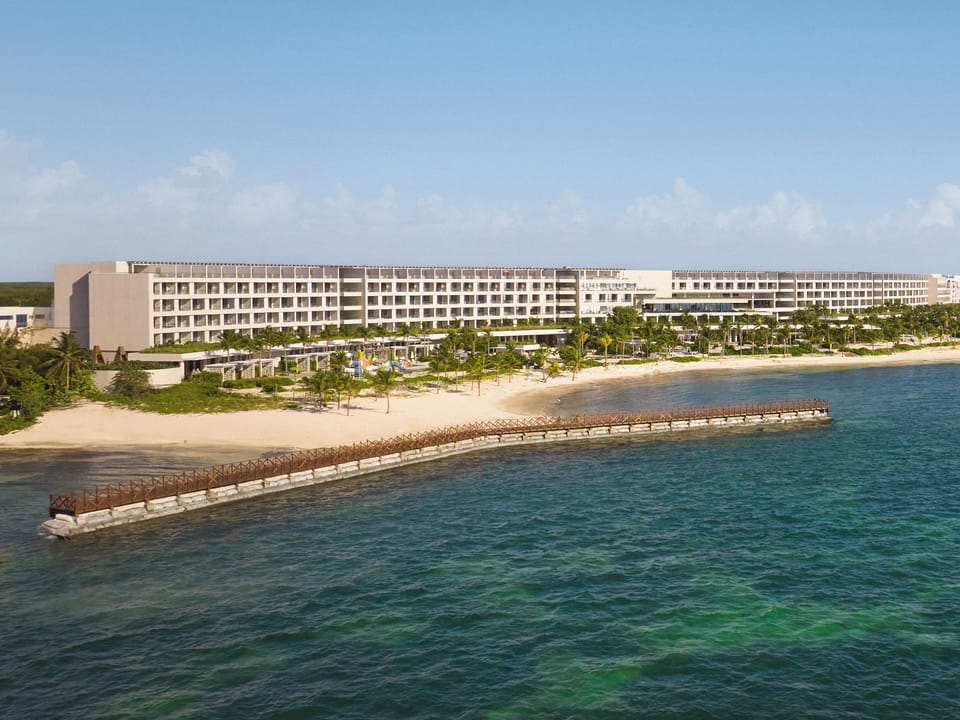 Wake up to endless ocean horizons along a pristine shoreline.
