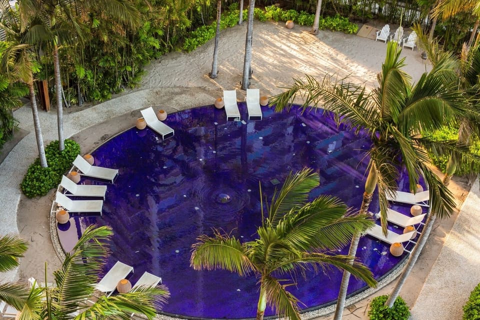 Drift into tranquility on a quiet, sunlit pool morning.