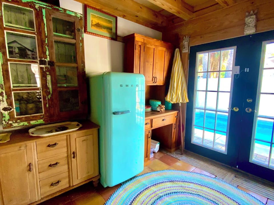 Cool SMEG refrigerator along with a separate larger freestanding freezer,.