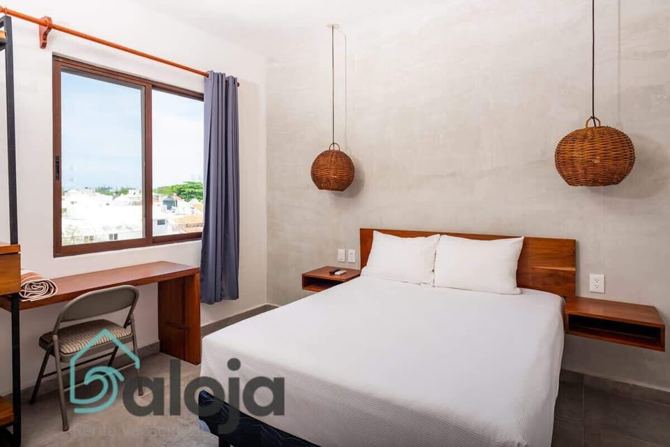 Habitación con buena vista a la ciudad con cama queen size