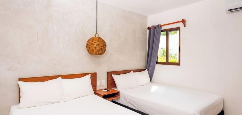 Habitación de dos camas individuales