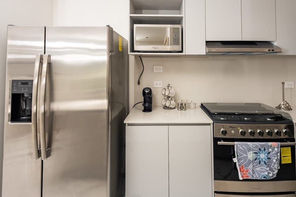 Cocina con todos los electrodomésticos para tu estancia