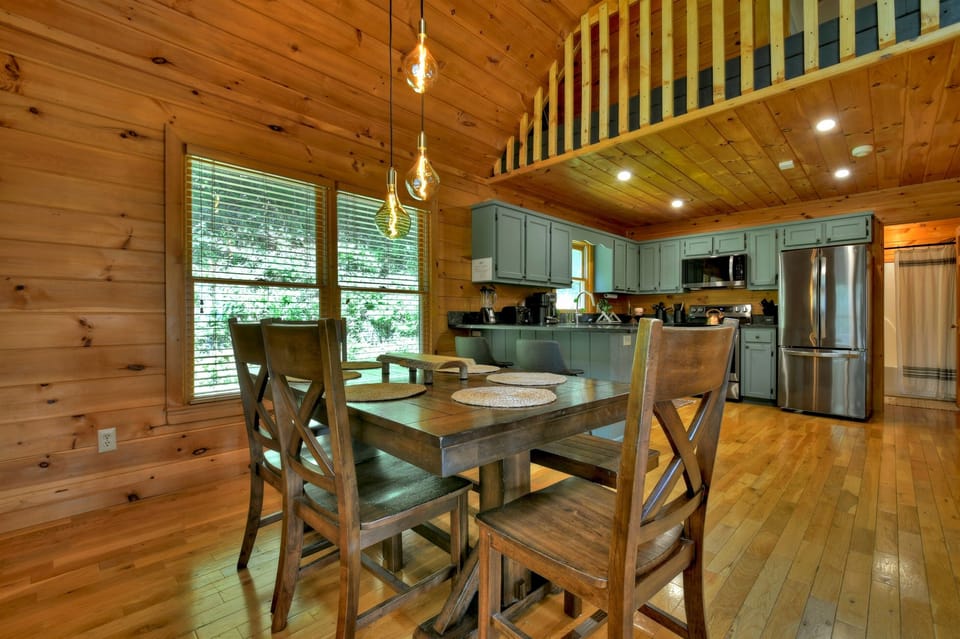 Rustic wood, chic lighting, and the hum of connection.
