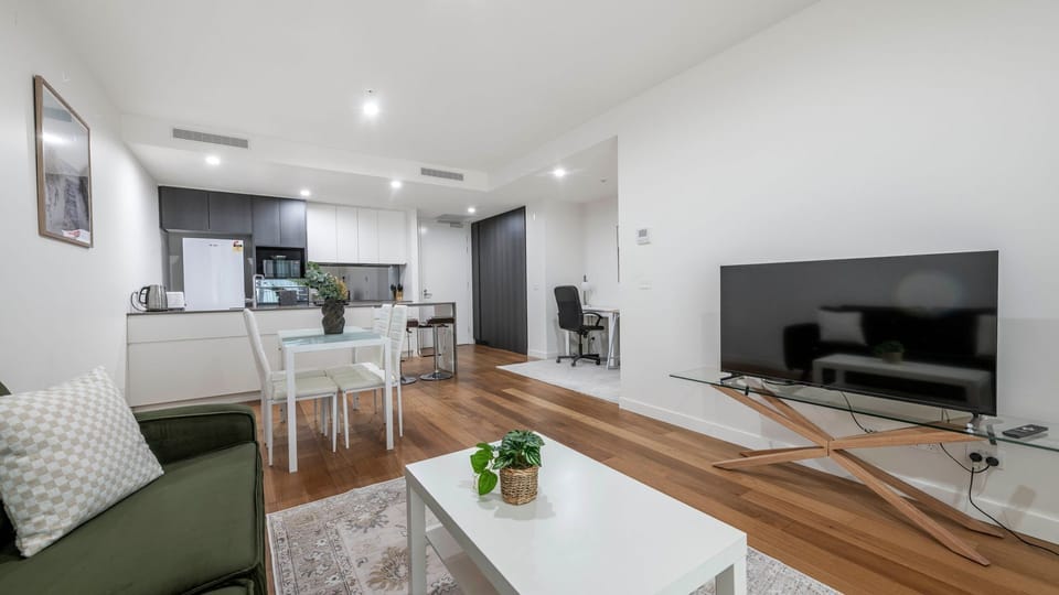 Modern open-plan living and dining area with stylish furniture