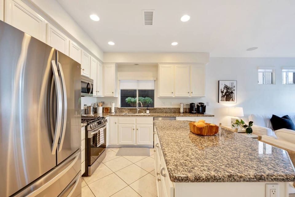 Fully stocked kitchen with supplies.