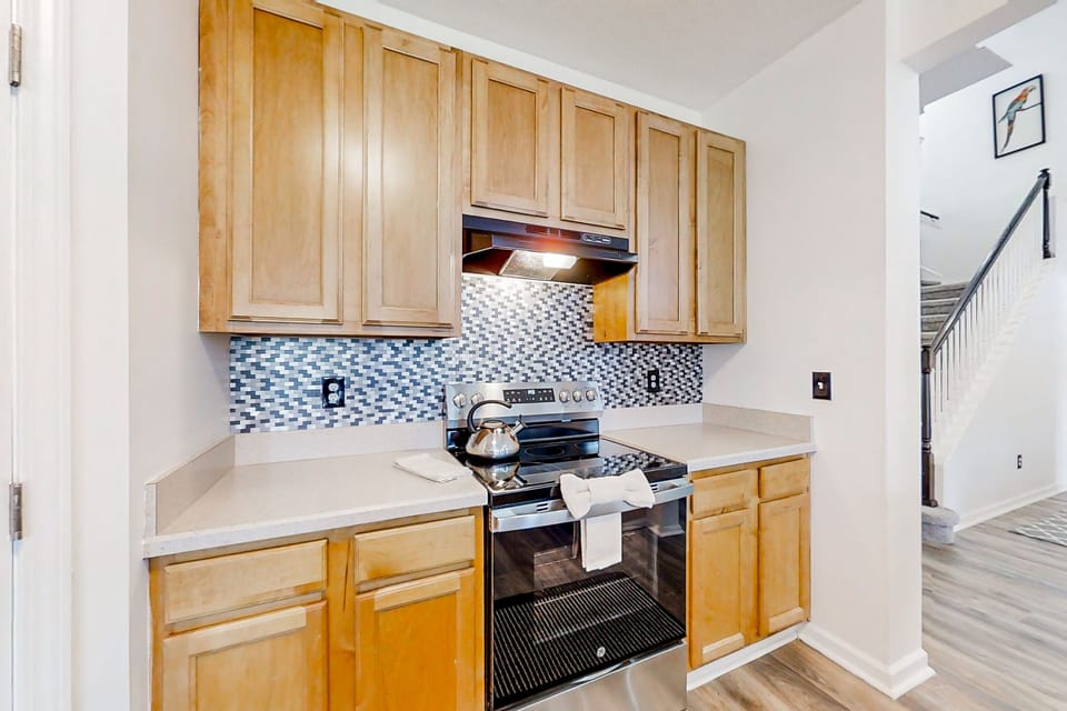 Fully equipped kitchen with appliances—ideal for extended stays and family meals.