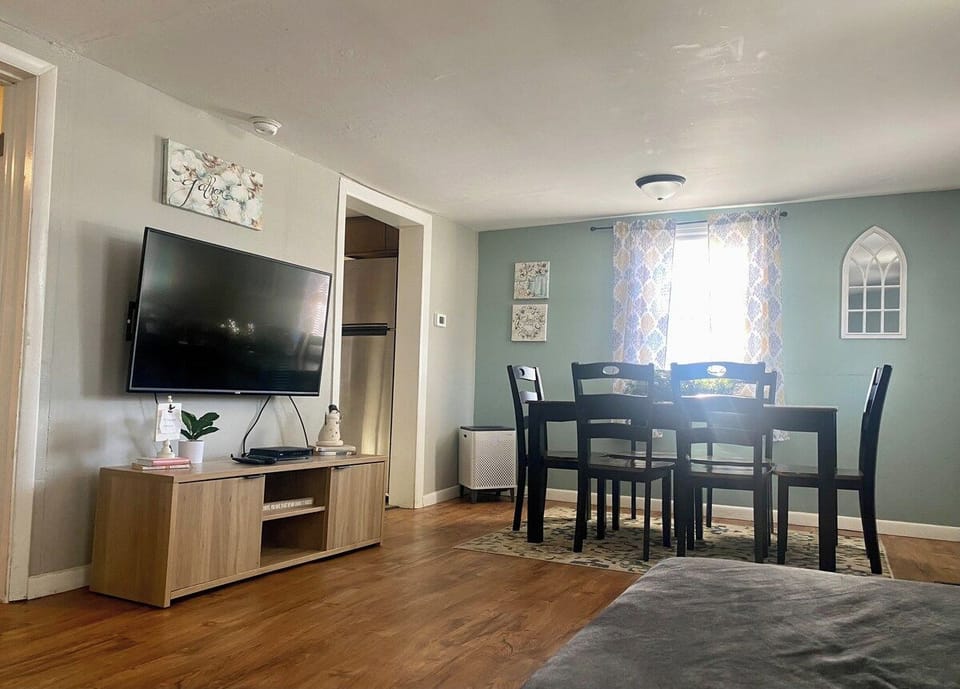 Living room and dining area with smart tv