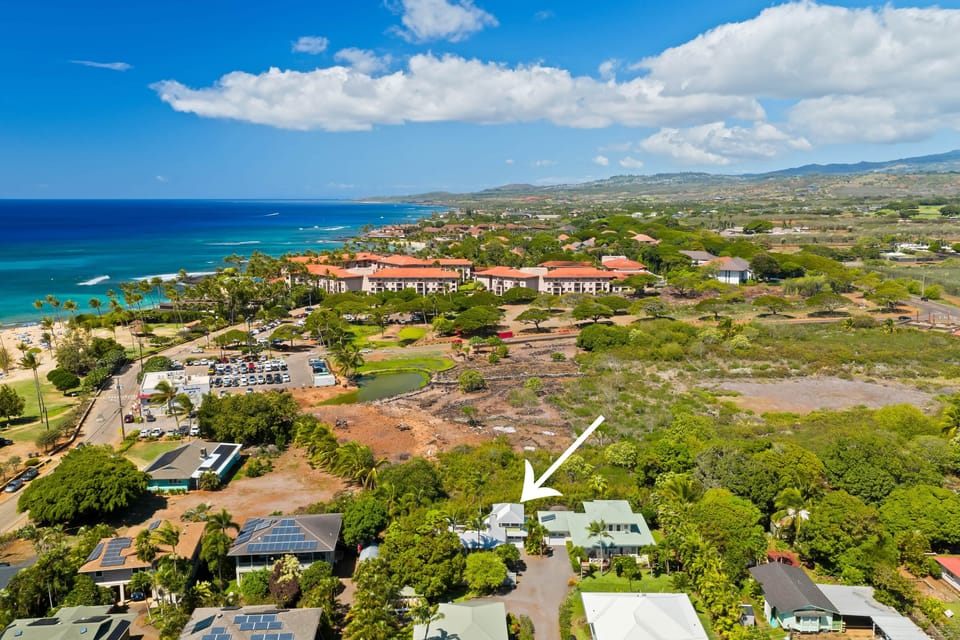 Arrow marks our Poipu cottage—walk to Poipu Beach, shops, and dining.